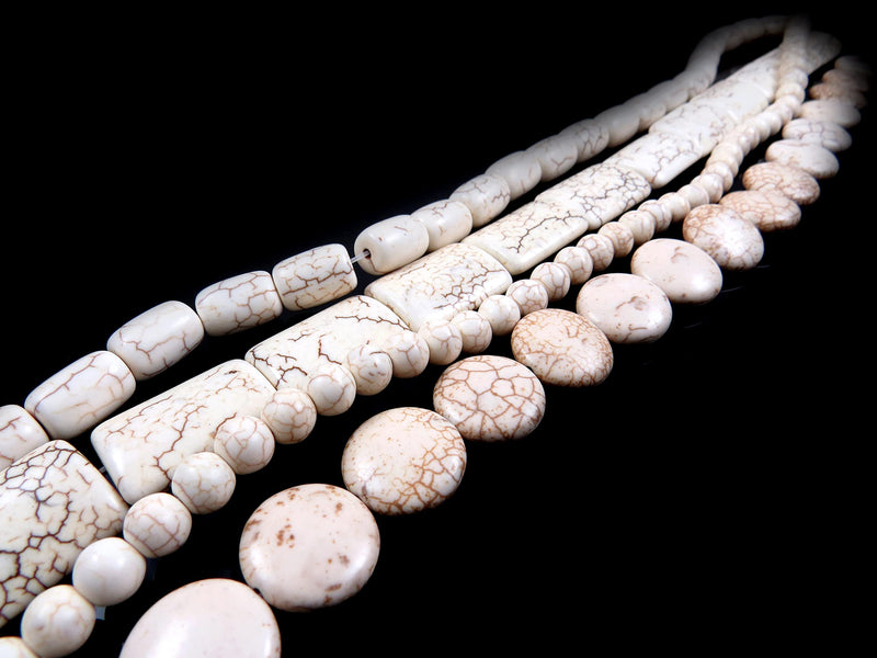 beads of Magnesite 4 strings size between 8-30mm, 4 styles, color White
