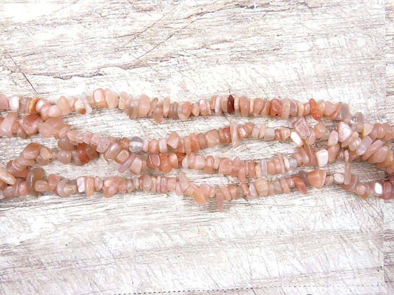 Sunstone Chips Semi-precious stone, 1 string 32" each, beads irregular size 4 to 7mm